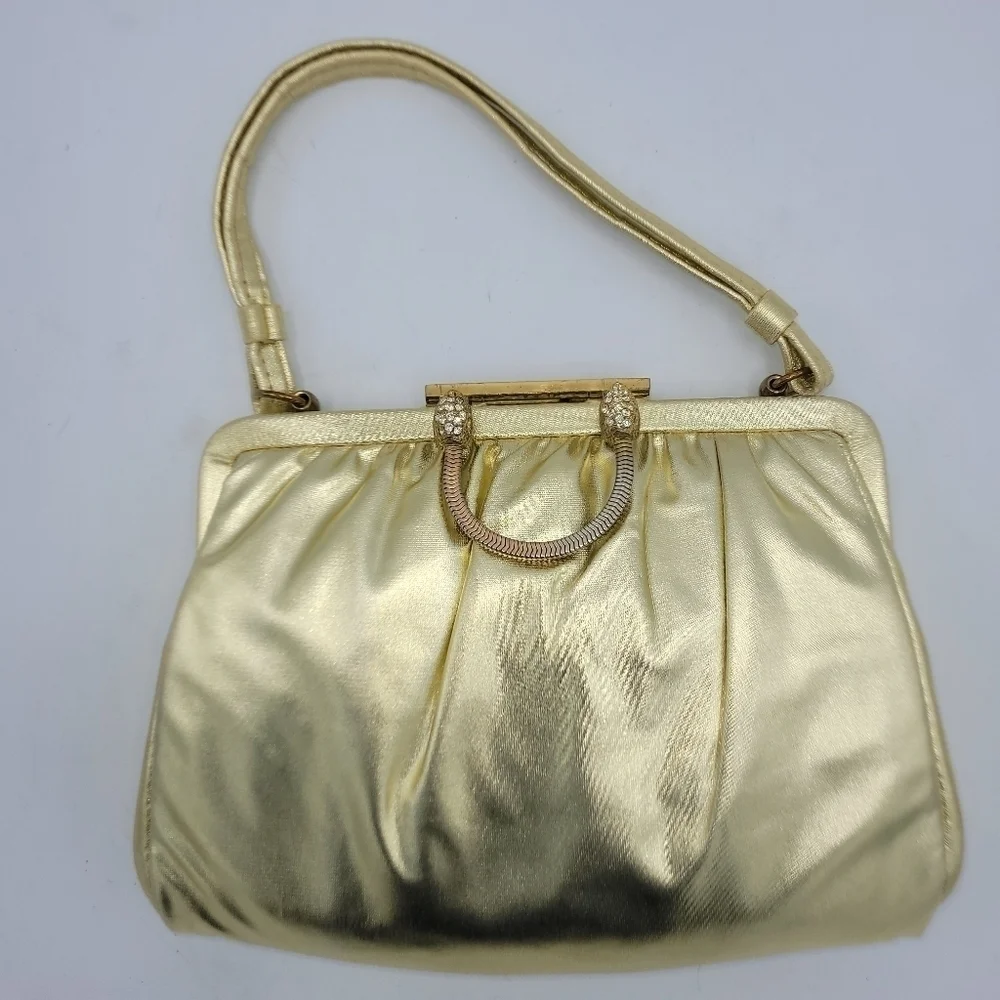 Vintage Andé Gold Clutch With Rhinestone Details Clasp.